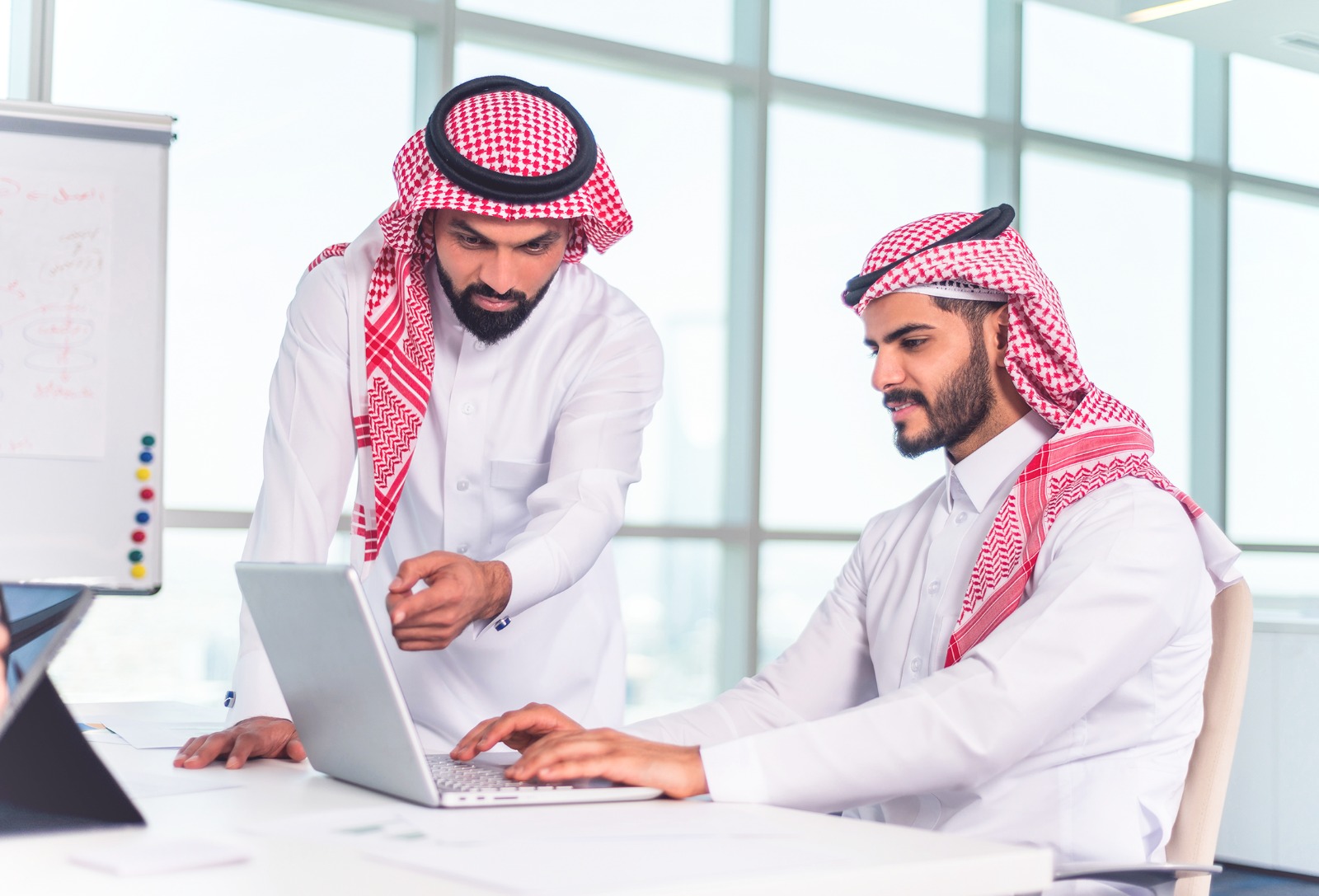 Saudi professionals in an applied workshop